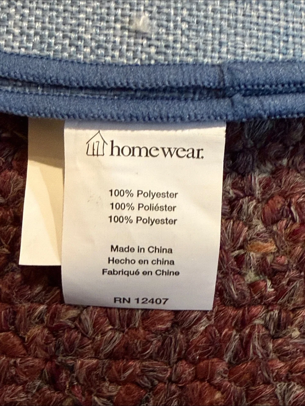Blue Round Placemat with Multi-Color Striped Kitchen Towel